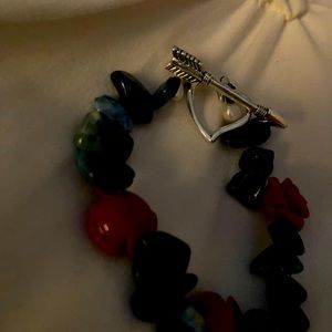 Bracelet of roses with teal and white pearl. Great